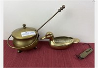 Brass fire starter,duck and scale.