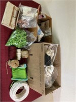 2 boxes with yarn, string, edging, and craft