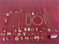 Gold toned costume jewelry, necklaces, earrings,