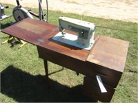 Singer sewing machine w/cabinet