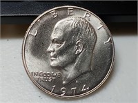 OF) 1974 s UNC silver Ike dollar