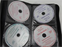 Binder Full of 21 Baby Einstein DVDs
