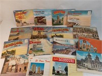 B4) 16 vintage postcard folders. Mostly linen.