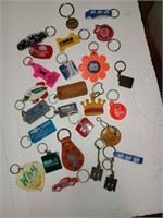 B4) assortment of vintage keychains. Car