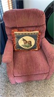 Pink recliner and horse pillow