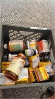 Crate of medical pills and blood glucose test