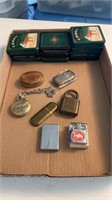 Lot of lighters, one zippo pill case tins and