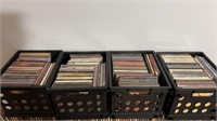 4 stackable CD Crates with CDs