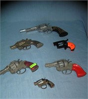 Collection of 6 all cast metal vintage cap guns