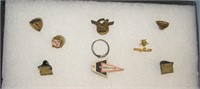 Group of vintage pins and awards