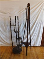 One antique coat rack and a plant stand
