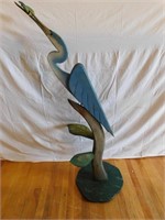 Very neat wooden pelican w/fish. 52" tall