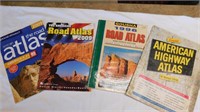 Four road atlases