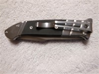 Folding knife by SOG 3.5" blade/ 8" long