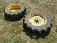 2-Firestone 11.2-24 Tires on 8 Hole Rims