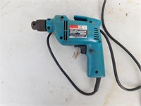 Makita electric drill, works