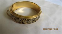 Gold tone bangle bracelet
