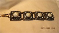 Faux button style pearl filagree bracelet