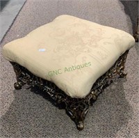 Vintage cast iron footstool w/upholstered cushion