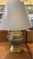 Brass and metal tall table lamp, with a shade,