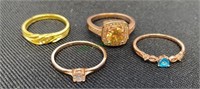 Lot of four costume rings size 10(1052)