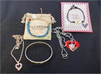 Jewelry lot includes necklaces with pendants,