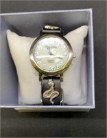 Strada watch with mother of pearl style face,