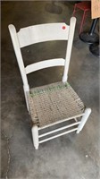 White painted antique side chair with woven seat.