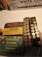 (2) Boxes w/ 30-40 Casings + 1 Shell