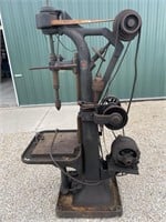 Industrial drill press runs