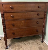 Four drawer cherry chest of drawers