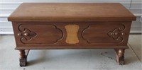 Cedar chest on legs with sewing supplies