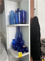 Assorted Blue Glass Jars and Glasses