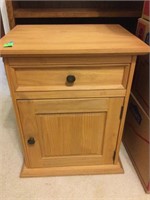 Ashley side table with drawer and door matches