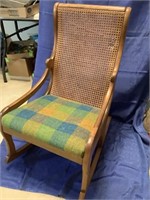 Antique cane back wooden rocking chair