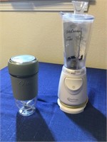 Two blenders one Oster USB blender and one Betty