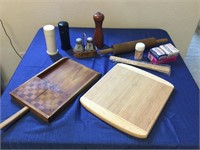 Two cutting boards and assorted salt and pepper