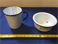 Two enamelware pieces. One measuring cup one