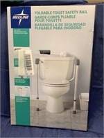 New in box foldable toilet safety rail