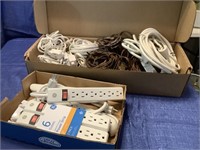 Large lot of extension cords and power strips