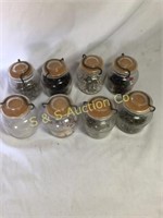 8-glass jars with sewing supplies