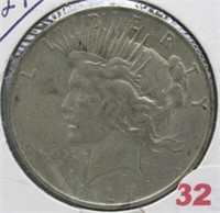 1927-D Peace Silver Dollar.