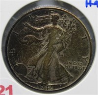 1943 Liberty Half Dollar Good Toned.