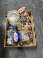 5 small jars full of buttons