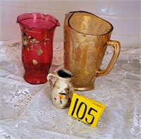 amber pitcher and vases and