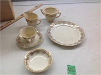 12 pl setting 22 kt gold dishes