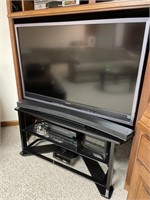 Sony TV with entertainment center and electronics
