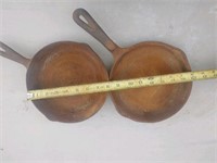 1 Wagner, 1 Unmarked cast iron pans