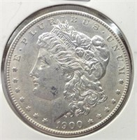 Of) 1900 better grade Morgan dollar