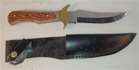 B4) fixed blade knife with sheath.